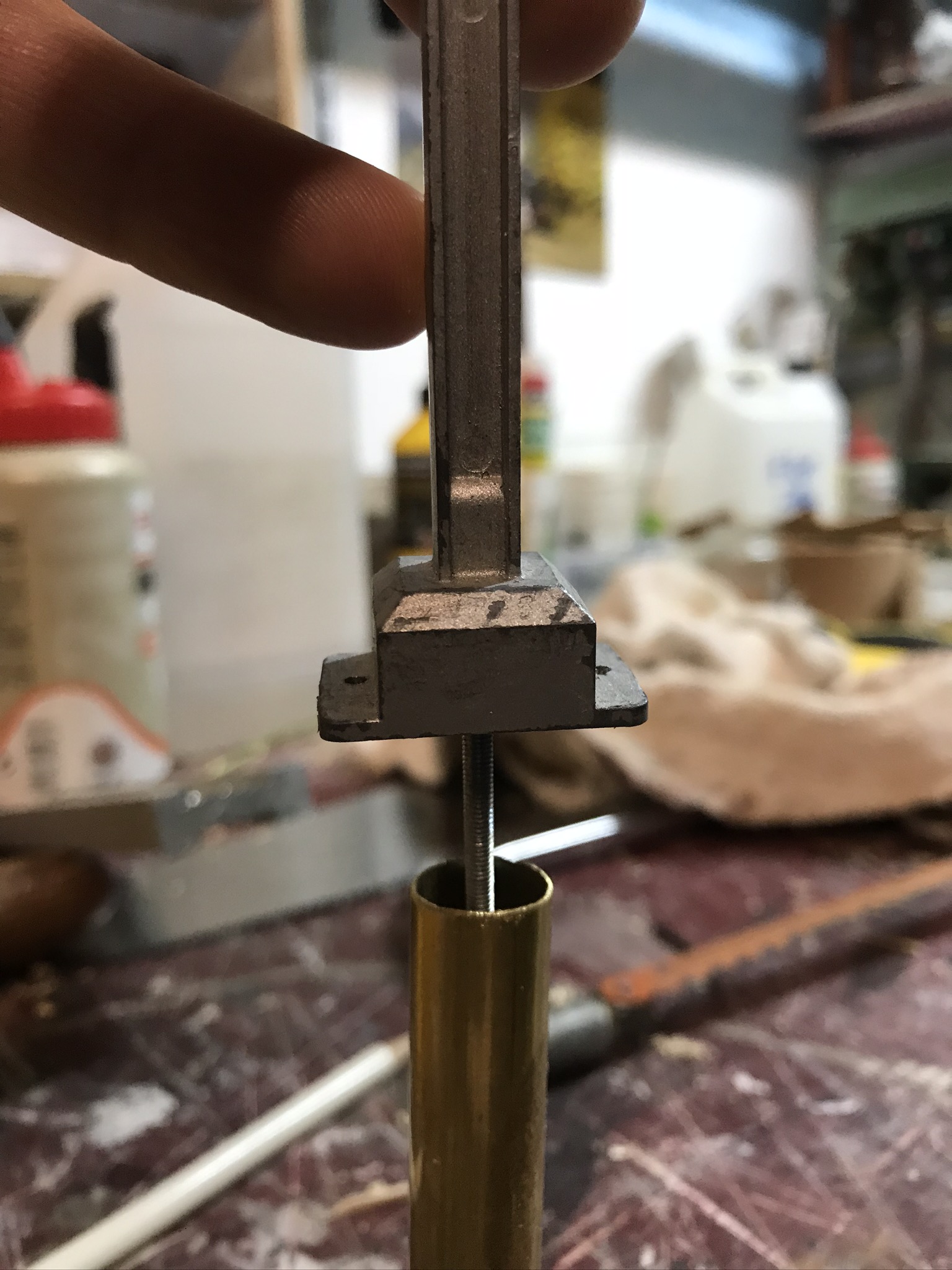 Pole with bolt are glued in the tube